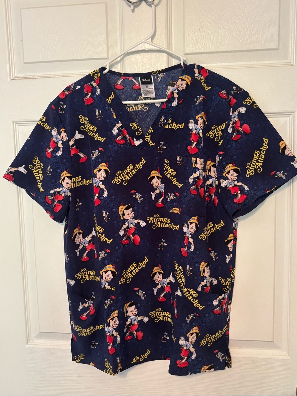 Disney Navy Scrub Top Pinocchio No Strings Attached * BRAND NEW WITHOUT TAGS*